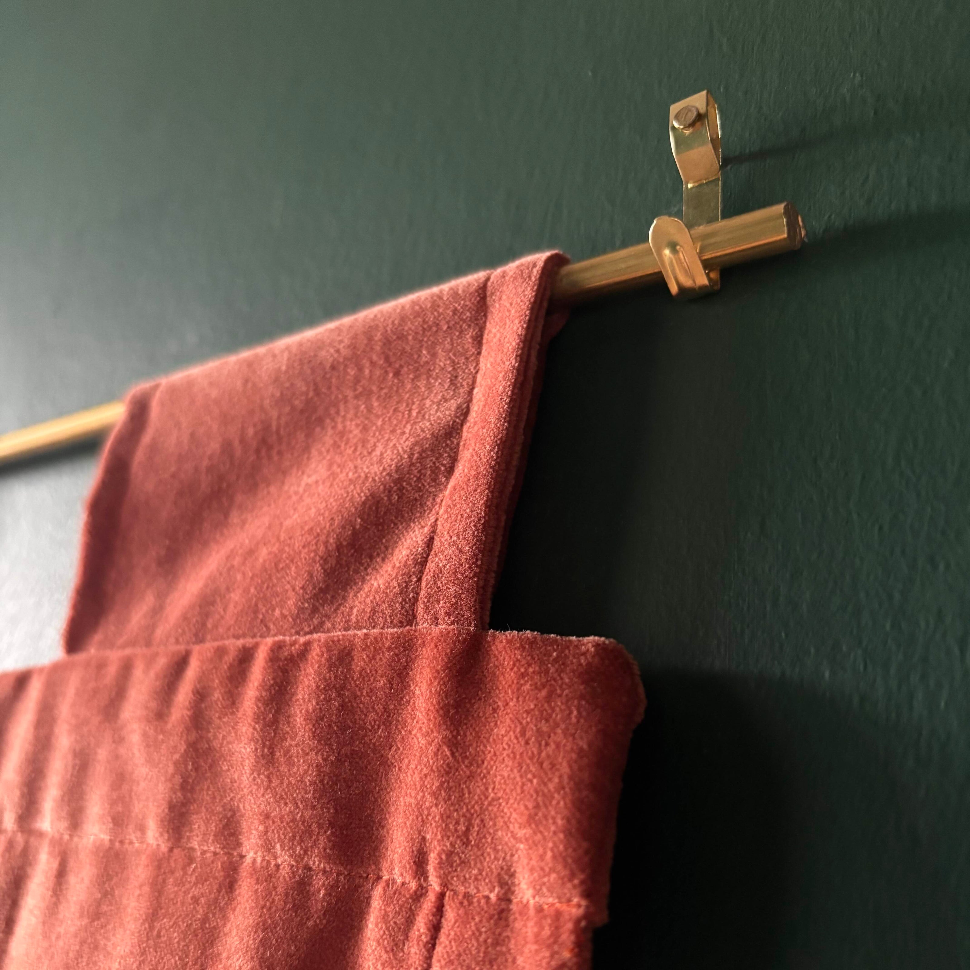 Orange banner on a dark green wall