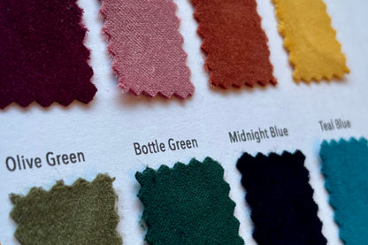 Fabric colour swatches with labels including Olive Green, Bottle Green, Midnight Blue, and Teal Blue.