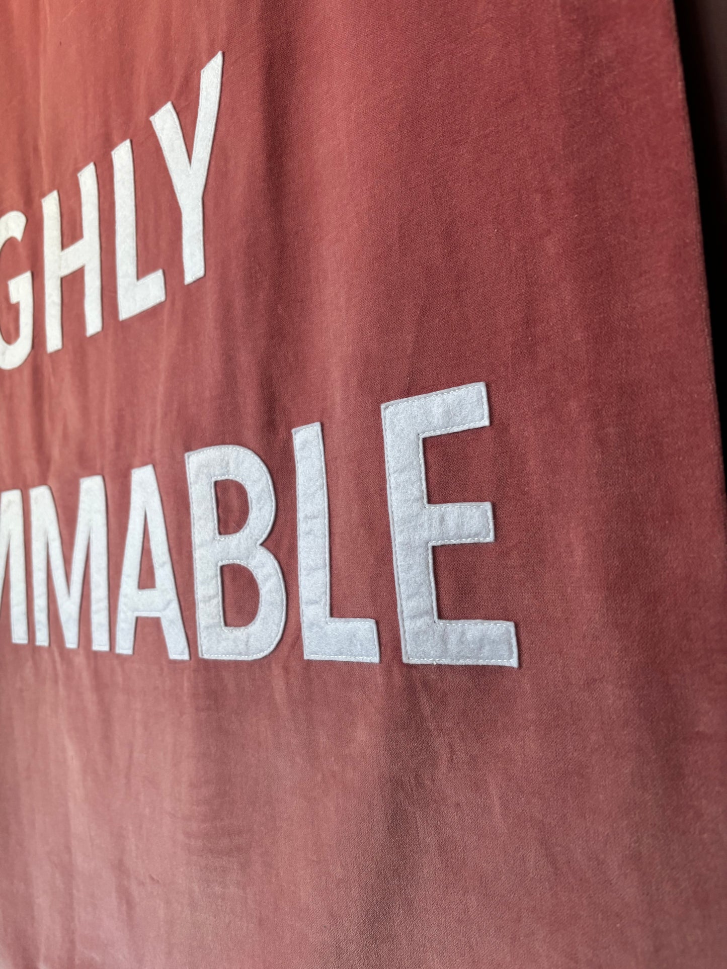 A close up of a pink velvet banner