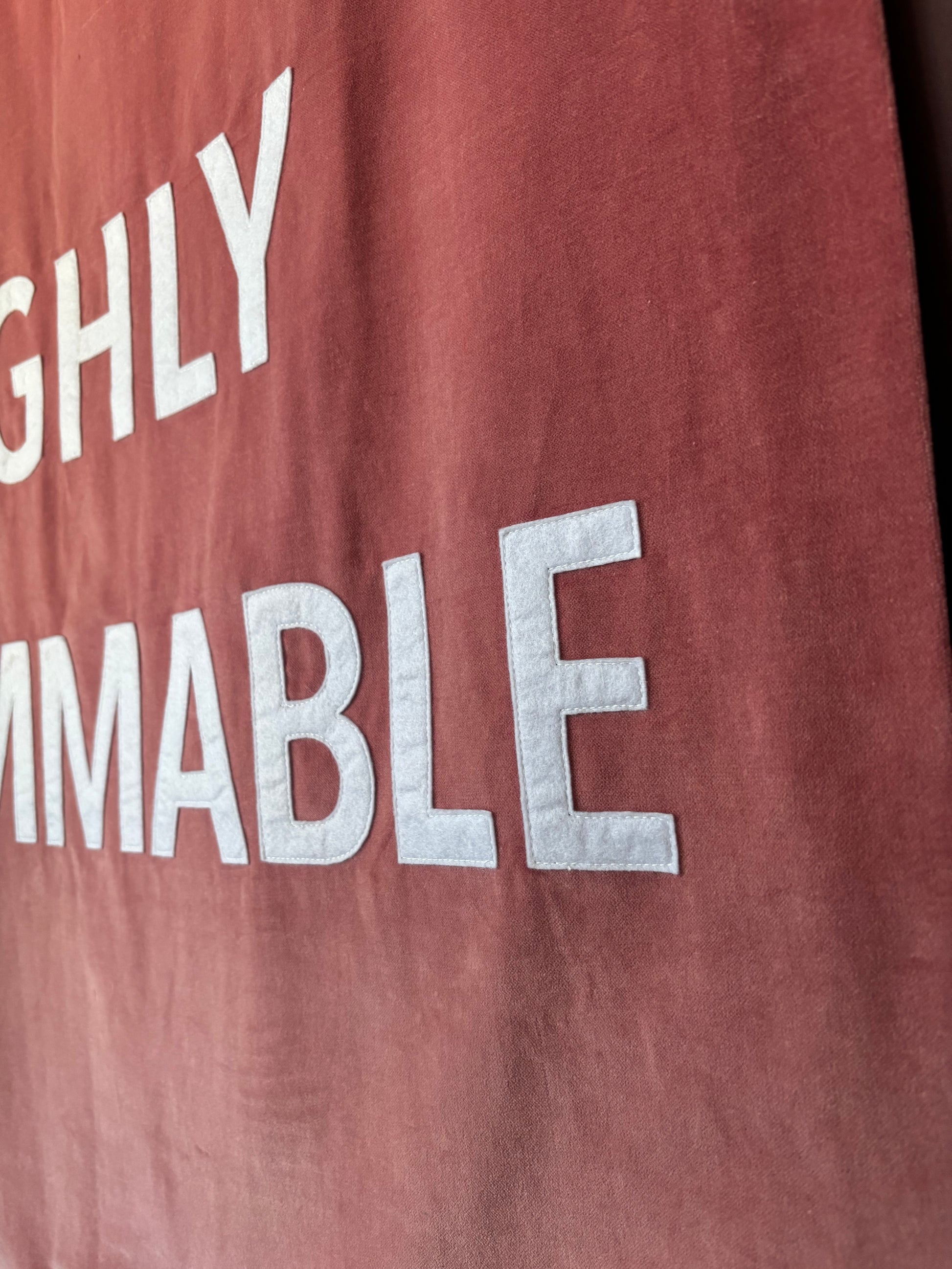 A close up of a pink velvet banner